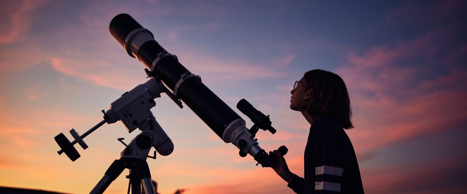 girl with telescope stargazing