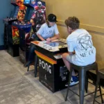 Kids arcade and axe throwing